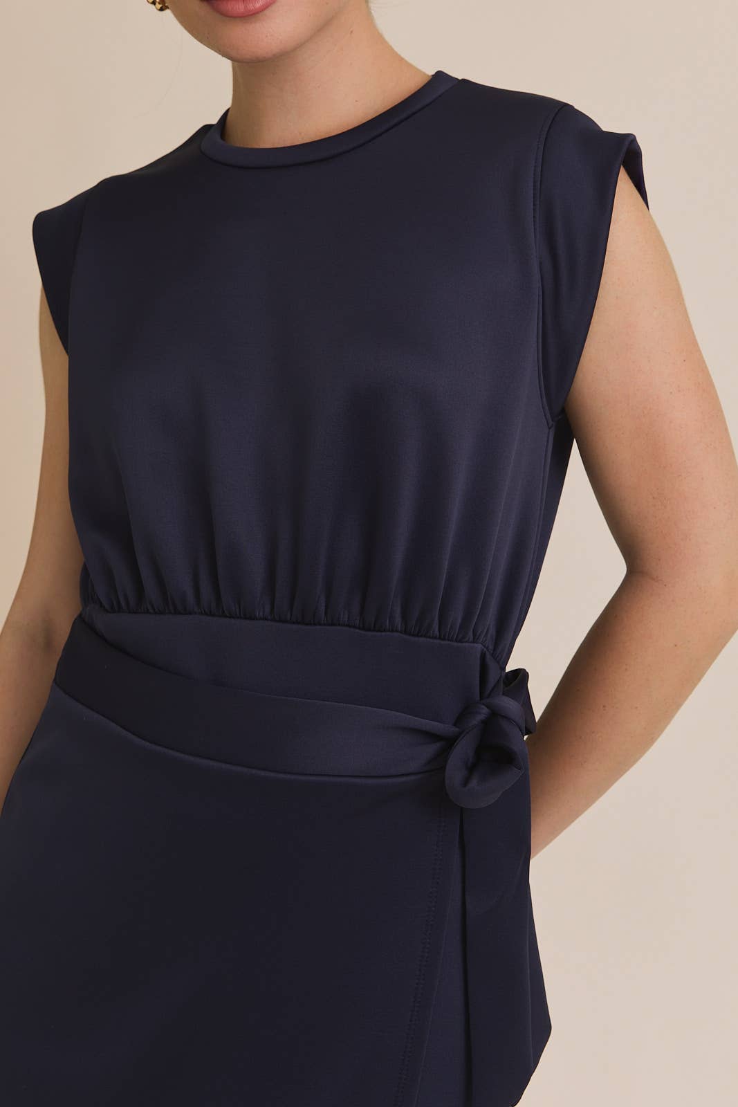 ROUND NECK SLEEVELESS WRAP MINI DRESS